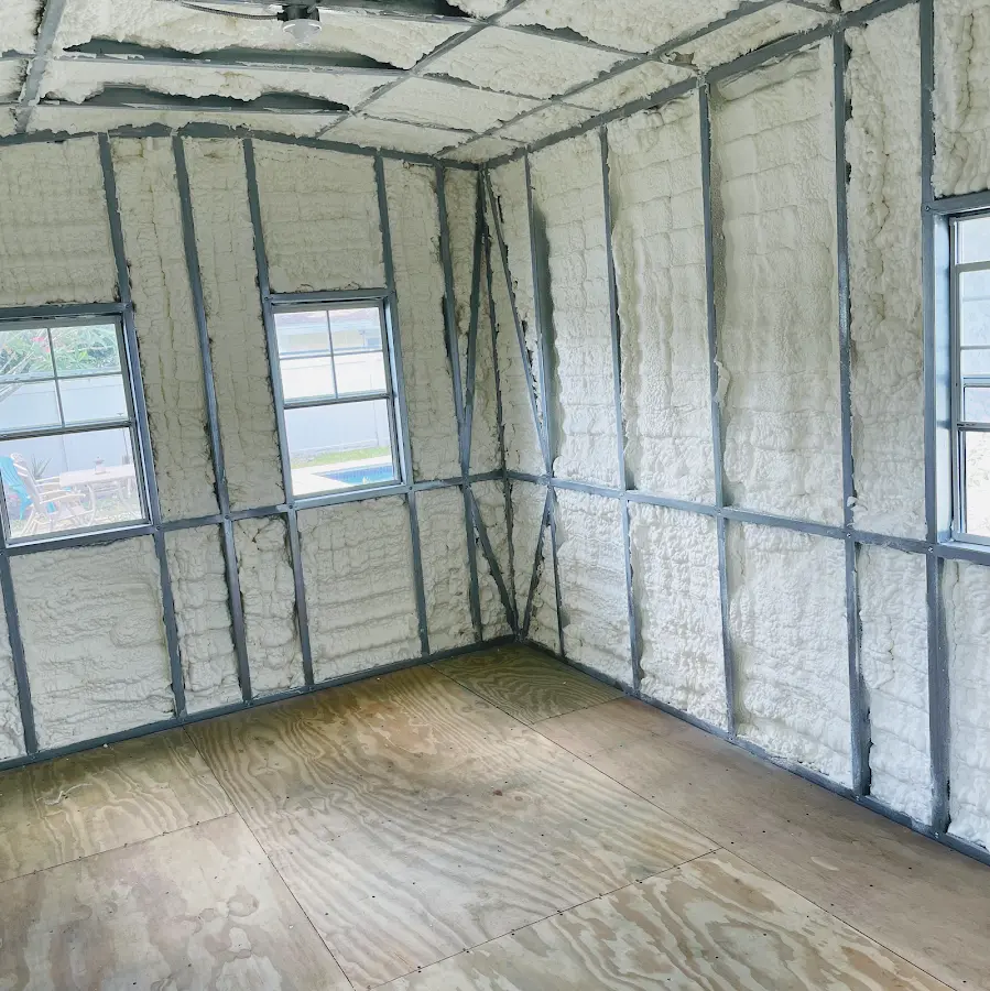Closed-cell spray foam insulation applied to wall cavities in a residential project in Welcome