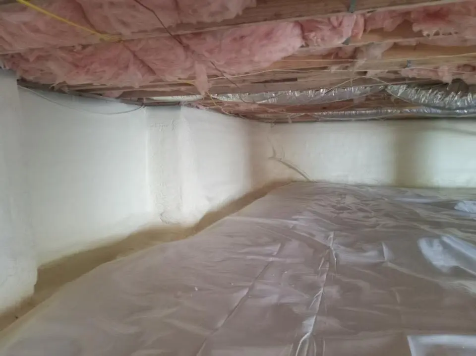 Crawl space encapsulation with closed-cell spray foam for Commercial Roof Restoration in Welcome